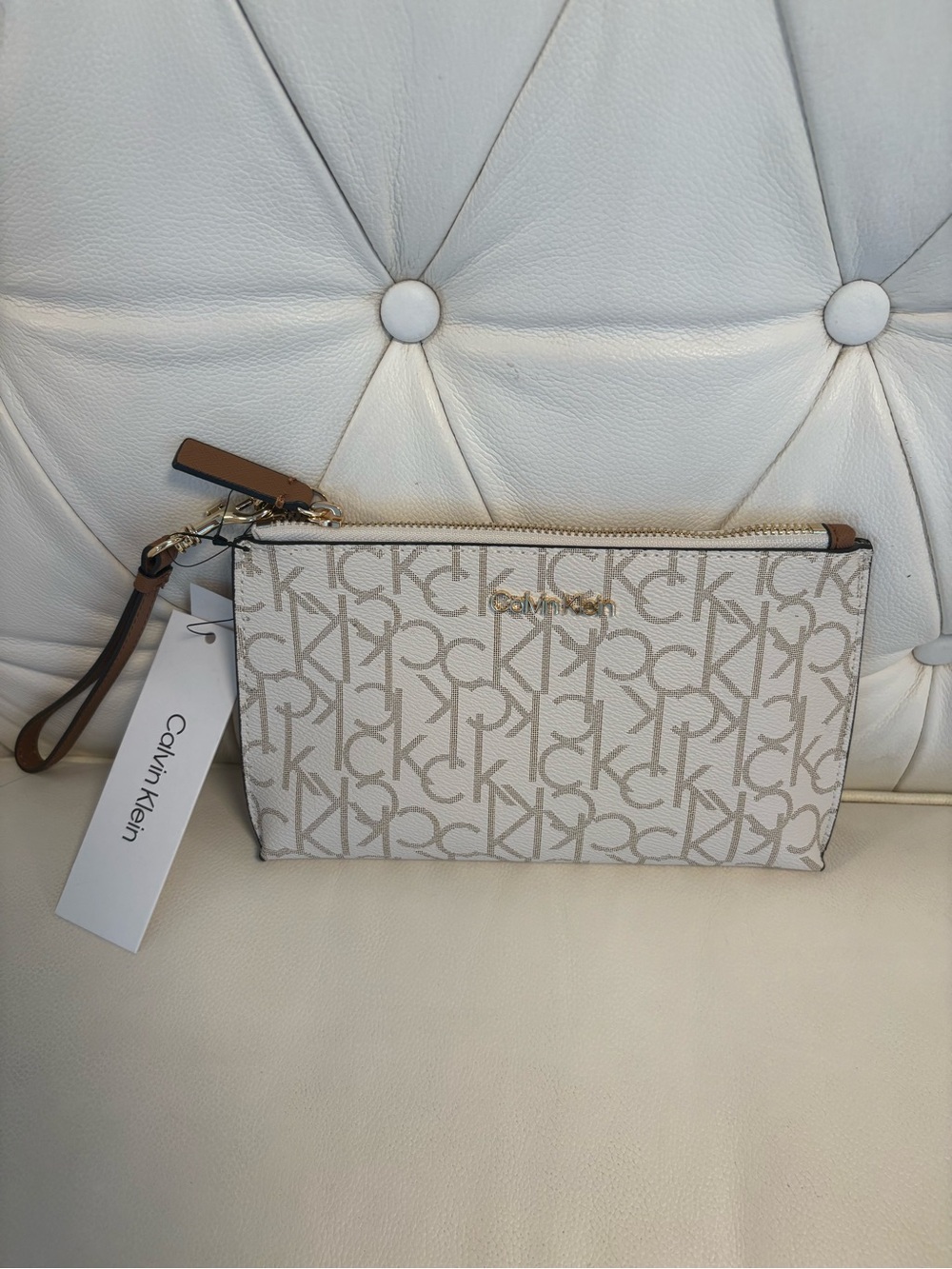 Calvin Klein Cream Beige Monogram Wristlet